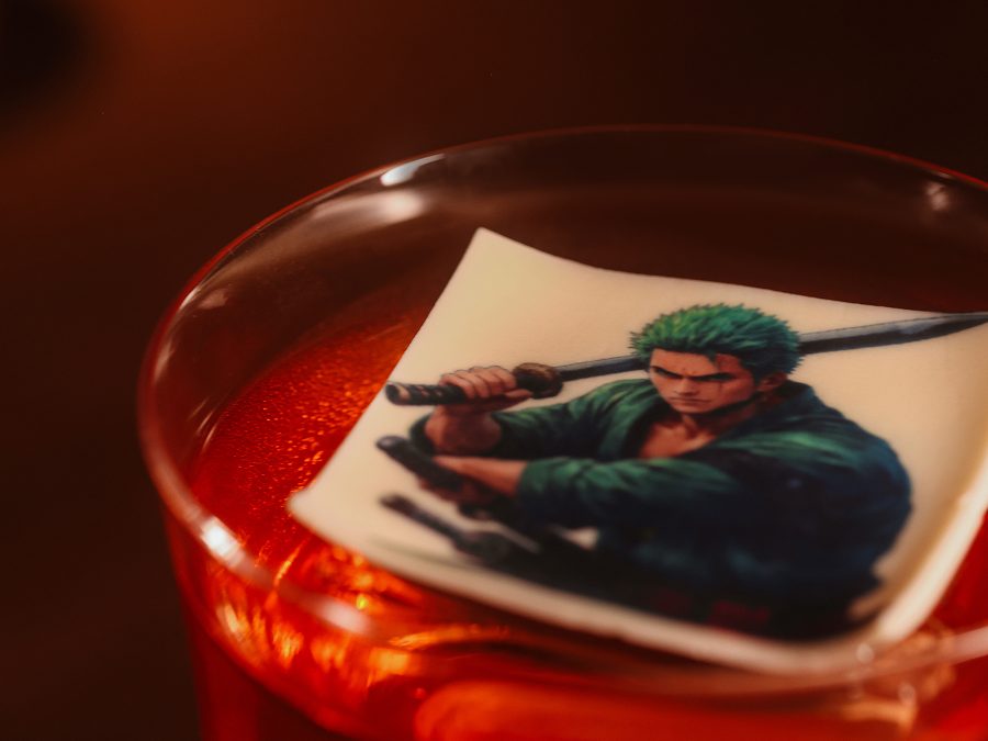 An Arcadia drink finished with a printed illustration floating on the surface.